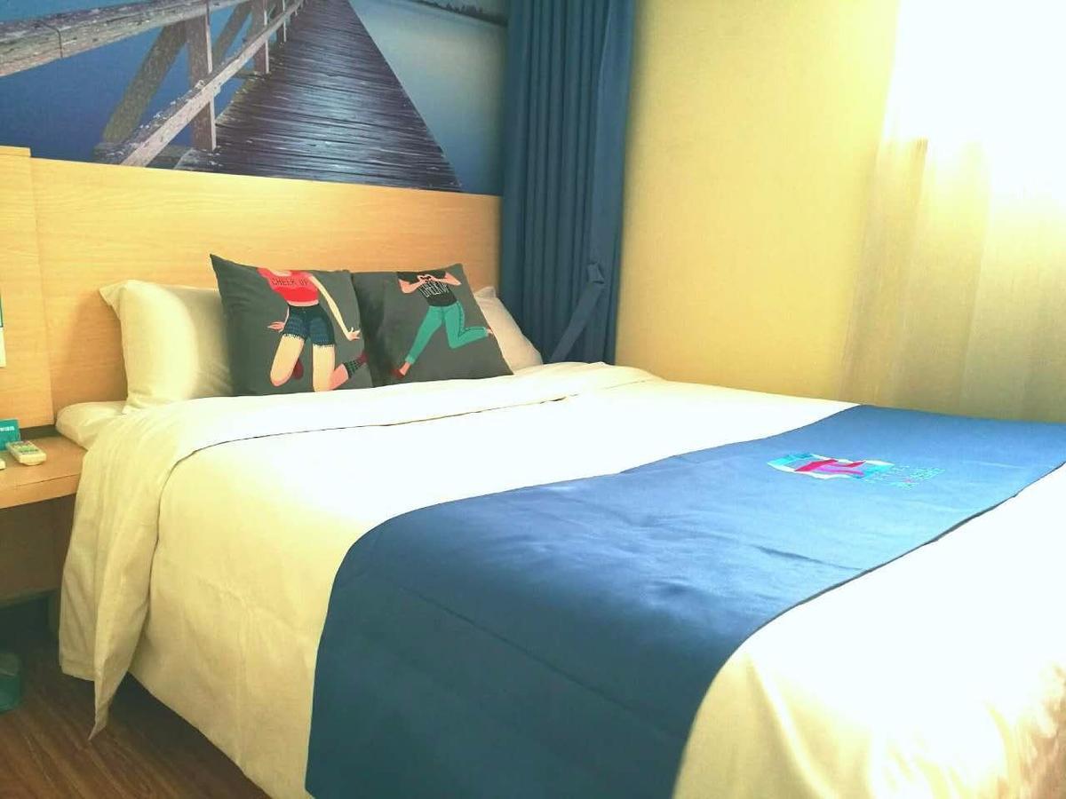 Pai Hotel Heze Dingtao Wantai City Exterior foto